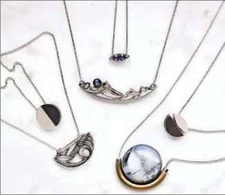  ?? CONTRIBUTE­D BY SHIRABROOK­S.COM ?? Jewelry artist Shira Brooks uses a variety of stones and metal finishes in her work.