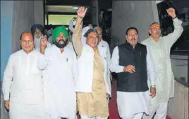  ?? KESHAV SINGH/HT ?? Indian National Lok Dal leaders protesting outside the Haryana Vidhan Sabha after they walked out of the House on the second day of session in Chandigarh on Tuesday; and (right) chief minister Manohar Lal Khattar replying to a question during the...