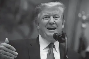  ?? Associated Press ?? ■ President Donald Trump gestures Friday as he speaks about the deployment of 5G technology in the United States during an event in the Roosevelt Room of the White House.