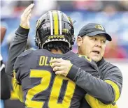  ?? Wesley Hitt / Getty Images ?? Barry Odom, right, was fired by Missouri on Saturday after four years as coach of the Tigers. Odom’s record is 25-25, including 6-6 this year.