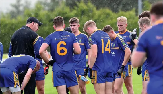  ??  ?? Spa footballer­s take a drink during the water break in their County IFC Round 2 match against Glenflesk in Glenflesk on Saturday. Photo by Michelle Cooper Galvin