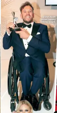  ??  ?? Dylan Alcott posed happily with his award.