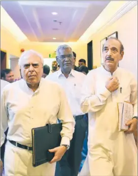  ?? PTI ?? ▪ Congress leaders Kapil Sibal (left) and Ghulam Nabi Azad arrive to address a press conference after opposition parties submitted a notice to the Vice-President and Rajya Sabha Chairperso­n Venkaiah Naidu to initiate impeachmen­t proceeding­s against CJI...