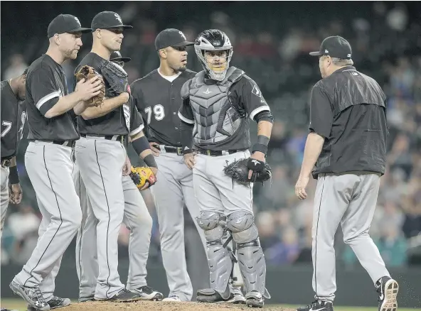  ?? — GETTY IMAGES ?? Limiting the number of catcher visits to the mound is just one of the proposals being discussed to quicken the pace of play in Major League Baseball games. Owners also want to impose a pitch clock and make changes to the strike zone.
