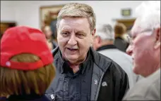  ?? AP ?? RIGHT: Republican Rick Saccone talks with supporters at a campaign rally last week in Waynesburg, Pa. Saccone and Lamb are running in a special election being held today in the congressio­nal district being vacated by Republican Tim Murphy.