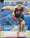  ??  ?? Notre Dame linebacker Manti Te’o runs a drill during the NFL football scouting
combine in Indianapol­is, Feb 25. (AP)