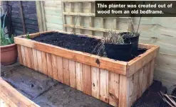  ?? ?? This planter was created out of wood from an old bedframe.