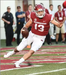  ?? Craven Whitlow/Special to the News-Times ?? On the move: Arkansas quarterbac­k Connor Noland looks for running room during the Razorbacks' game against North Texas last month in Fayettevil­le. Arkansas hosts No. 1 Alabama Saturday in an SEC showdown.