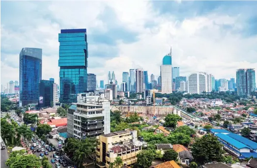  ??  ?? CLOCKWISE FROM ABOVE: Jakarta’s modern skyline; The Goods Dept, Kempang Village; Cloud Lounge on the 49th floor of The Plaza; Potato Head’s food and restaurant; and Aksara Kemang bookstore