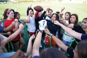  ?? ?? Elsa Morin, 17, center right, leads a chant as Redondo Union High School girls try out for a flag football team Sept. 1, 2022, in Redondo Beach, Calif. California officials are expected to vote Friday on the proposal to make flag football a girls’ high school sport for the 2023-24 school year. (AP Photo/ashley Landis, File)