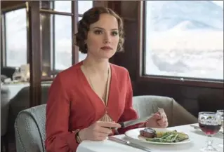  ?? NICOLA DOVE, TWENTIETH CENTURY FOX ?? Daisy Ridley plays Mary Debenham in Kenneth Branagh’s take on the Agatha Christie classic, "Murder on the Orient Express."