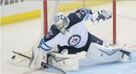  ?? BILL BOYCE/ THE ASSOCIATED PRESS ?? The stellar play of goaltender Ondrej Pavelec has the Winnipeg Jets heading into their playoff series with the Anaheim Ducks on Thursday on a major high.