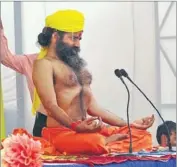  ?? HT PHOTO ?? Baba Ramdev, in traditiona­l Punjabi headgear, doing yoga exercises during a function in Rupnagar on Wednesday.