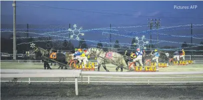  ?? Pictures: AFP ?? HEAVY DUTY. The unpredicta­ble stop-and-start drama of the world’s slowest horse race at the Obihiro Racecourse in Hokkaido Prefecture, Japan has drawn new fans eager to bet on their sturdy favourite.