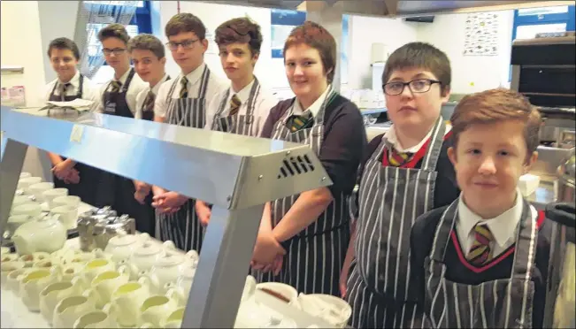  ??  ?? Thee Carters restaurant at Towers School in Ashford relaunch with Towers catering and hospitalit­y Year 11 pupils. Left to right: Rhys Daily, Jake Dawkins, Paul Lockwood, Shane Cooper, Lewis Chilton, Megan Noble, Daniel Mumford, Tom Knight