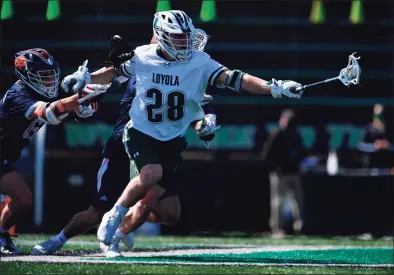  ?? Loyola Athletics / Larry French ?? Greenwich’s Bailey Savio has played a key role in leading Loyola into the NCAA men’s lacrosse tournament.