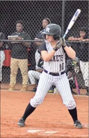  ?? / Lorene Parker ?? Anna Lewis squares up for a hit against the Douglass defense during their first round playoff appearance.