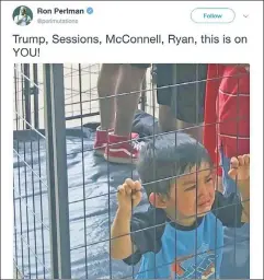  ??  ?? Fake news: A child in a staged protest against US immigratio­n policy.