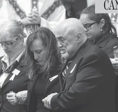  ?? CHRIS YOUNG / THE CANADIAN PRESS ?? Rocco and Carmela D’Amico follow the casket of their daughter Anne Marie following her funeral service in Toronto on Wednesday. D’Amico was one of the 10 victims of last Monday’s van attack on Yonge Street.