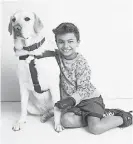  ?? KOHL'S ?? Adaptive clothing has helped 8-year-old Jai Srinivasan – with his dog, Banks – become more independen­t, says his mom, Kate Sowerwine. “The fact that he could open and close it by himself and the smile on his face,” she said.