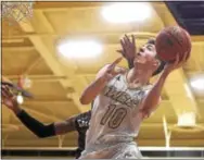  ?? PETE BANNAN — DIGITAL FIRST MEDIA ?? West Chester’s Jackson Hyland, a Kennett High School grad, goes in for a layup against Cal on Friday.