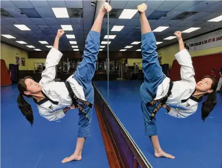  ?? Arnold Gold/Hearst Connecticu­t Media ?? Haley Han, 15, demonstrat­es a kick at World Champion Taekwondo in New Haven on March 9.