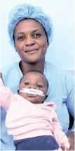  ?? ?? FARAI Mugobogobo with her 3-month-old son, Junior.