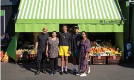  ?? Photograph: Linda Nylind/The Guardian ?? ‘London’s coolest corner shop’ … from left, Mayank, Anju, Priyesh, Alpesh and Neelam, outside Londis N16.