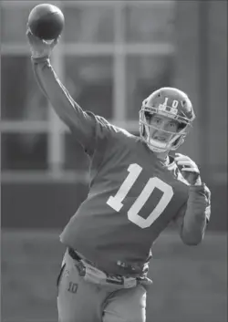  ?? ASSOCIATED PRESS FILE PHOTO ?? Eli Manning will be back at QB for the New York Giants on Sunday against Dallas.