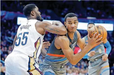  ?? [PHOTO BY BRYAN TERRY, THE OKLAHOMAN] ?? Terrance Ferguson, right, and the Thunder will open play in the NBA’s Las Vegas Summer League on Friday.