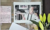  ?? DREW ANGERER GETTY ?? Notes, photos and flowers are left in memory of Anthony Bourdain at the closed location of Brasserie Les Halles.