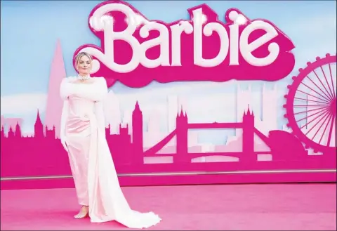  ?? ?? Margot Robbie attends the European premiere of "Barbie" in London, Britain July 12, 2023. (Reuters photo)