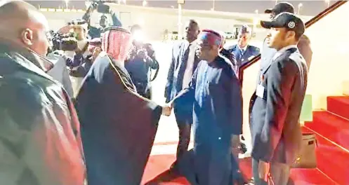  ?? ?? President Bola Ahmed Tinubu received upon arrival at Doha Airport yesterday