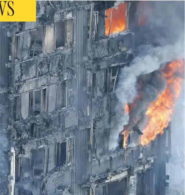  ?? MATT DUNHAM / THE ASSOCIATED PRESS ?? A massive overnight fire ravages a highrise apartment building in London on Wednesday. Hundreds of the building’s 500 residents were unaccounte­d for. Some estimated that the death toll could rise above 100.