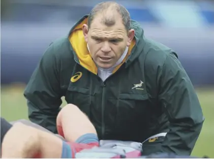  ??  ?? 0 South Africa-born Pieter de Villiers, left, will join Scotland as a short-term scrum coach while Welshman Steve Tandy will return from Australia as defence coach.