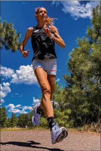  ?? THE NEW YORK TIMES ?? As the pandemic makes gatherings difficult, runners including longdistan­ce competitor Stephanie Bruce in Arizona are turning to technology to train, connect and compete.