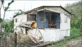  ?? ERIKA P. RODRIGUEZ / THE NEW YORK TIMES ?? The damaged home of Lercys Torres and Jorge Malave in Adjuntas, Puerto Rico, is shown on Nov. 8. The couple’s 3 1/2-month-old baby, Isaías, died after spending his entire short life in the local hospital, which lost power after Hurricane Maria. “He got...