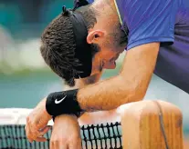  ?? CHRISTOPHE ENA/THE ASSOCIATED PRESS ?? Juan Martin del Potro stops at the net Saturday as he loses the first set against Andy Murray during their third-round match of the French Open in Paris. Murray ousted del Potro in three sets.