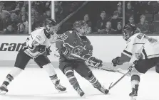  ?? LOUIS-CHARLES DUMAIS/CWHL ?? Marie-Philip Poulin and Les Canadienne­s de Montreal face the Calgary Inferno for the Clarkson Cup on Sunday.