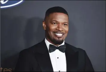  ?? AP FILE PHOTO ?? In this Feb. 22 file photo, Jamie Foxx arrives at the 51st NAACP Image Awards at the Pasadena Civic Auditorium in Pasadena. The Pixar film “Soul” will skip theaters and instead premiere on Disney+ on Christmas, the Walt Disney Co. announced Thursday, sending one of the fall’s last big movies straight to streaming. The film, about a middle school teacher played by Foxx, with dreams of becoming a jazz musician, was originally to premiere at the Cannes Film Festival.