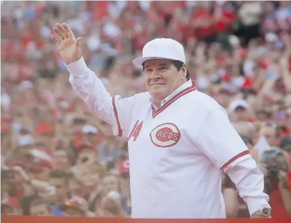  ?? — THE ASSOCIATED PRESS FILES ?? Former Red Pete Rose waves to the crowd as he is introduced during a ceremony to honour the 1976 World Series champions team in 2016 in Cincinnati. A woman has accused Rose of having a sexual relationsh­ip with her when she was a minor