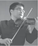  ??  ?? Young violin virtuoso Joaquin Maria Gutierrez.
