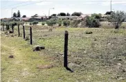  ??  ?? LACK OF SECURITY: Undertaker­s say they have been pleading with the municipali­ty to fence off the Papenkuil Cemetery