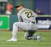  ?? BOB LEVEY — GETTY IMAGES ?? Ramon Laureano (22) of the Oakland Athletics makes a catch on a fly ball by Jose Abreu of the Houston Astros in the seventh inning on Friday in Houston.