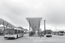  ??  ?? Buses prepare to leave the Central Park Regional Transporta­tion Station in Denver in April.