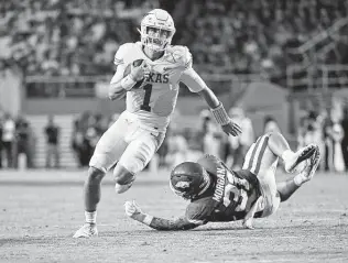  ?? Michael Woods / Associated Press ?? Hudson Card (1) will watch Casey Thompson start at quarterbac­k for Texas against Rice on Saturday after struggling in the Longhorns’ 40-21 road loss to Arkansas.