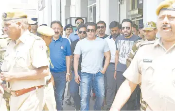  ?? — AFP ?? Salman walks out of Jodphur airport ahead of tomorrow’s court hearing in relation of the long-running wildlife poaching case against him in Jodhpur.