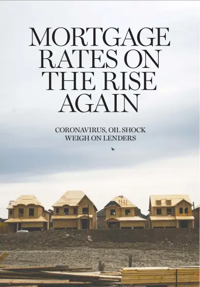  ?? TYLER ANDERSON / NATIONAL POST ?? Lenders had dropped rates to historic lows this month as the central bank twice cut its key interest rate,
ultimately lowering it to 0.75 per cent, one of the lowest levels on record.