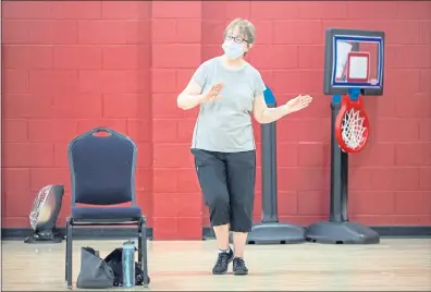  ?? ANDA CHU — STAFF ARCHIVES ?? Mary Peterson, 79, attends a senior fitness class while continuing to wear a mask at the Central YMCA in San Jose as California fully reopened on June 15.