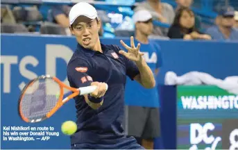  ?? — AFP ?? Kei Nishikori en route to his win over Donald Young in Washington.